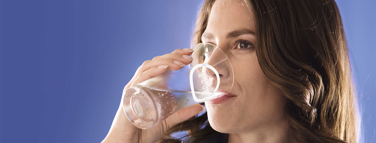 woman drinking sparkling water