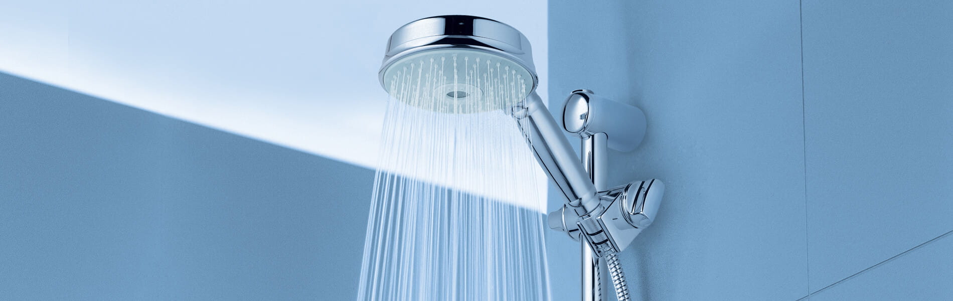 Rainshower rustic shower head spraying water