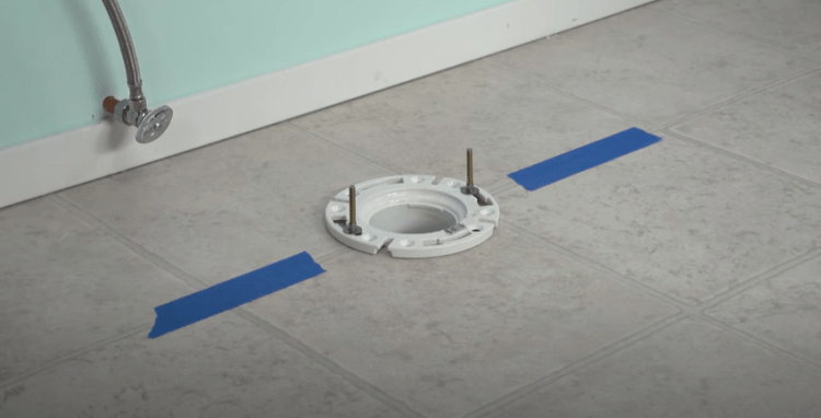 how to install toilet bolts to floor