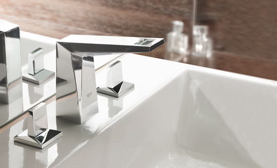 sink and faucet with wood walls
