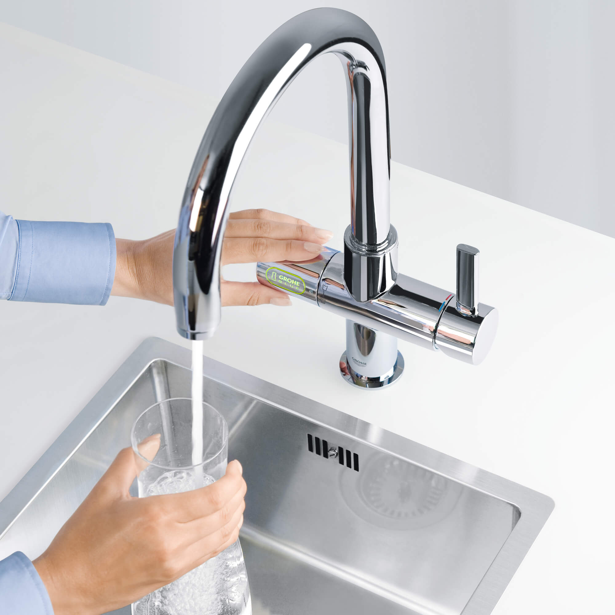 filling up water bottle with Grohe Blue faucet