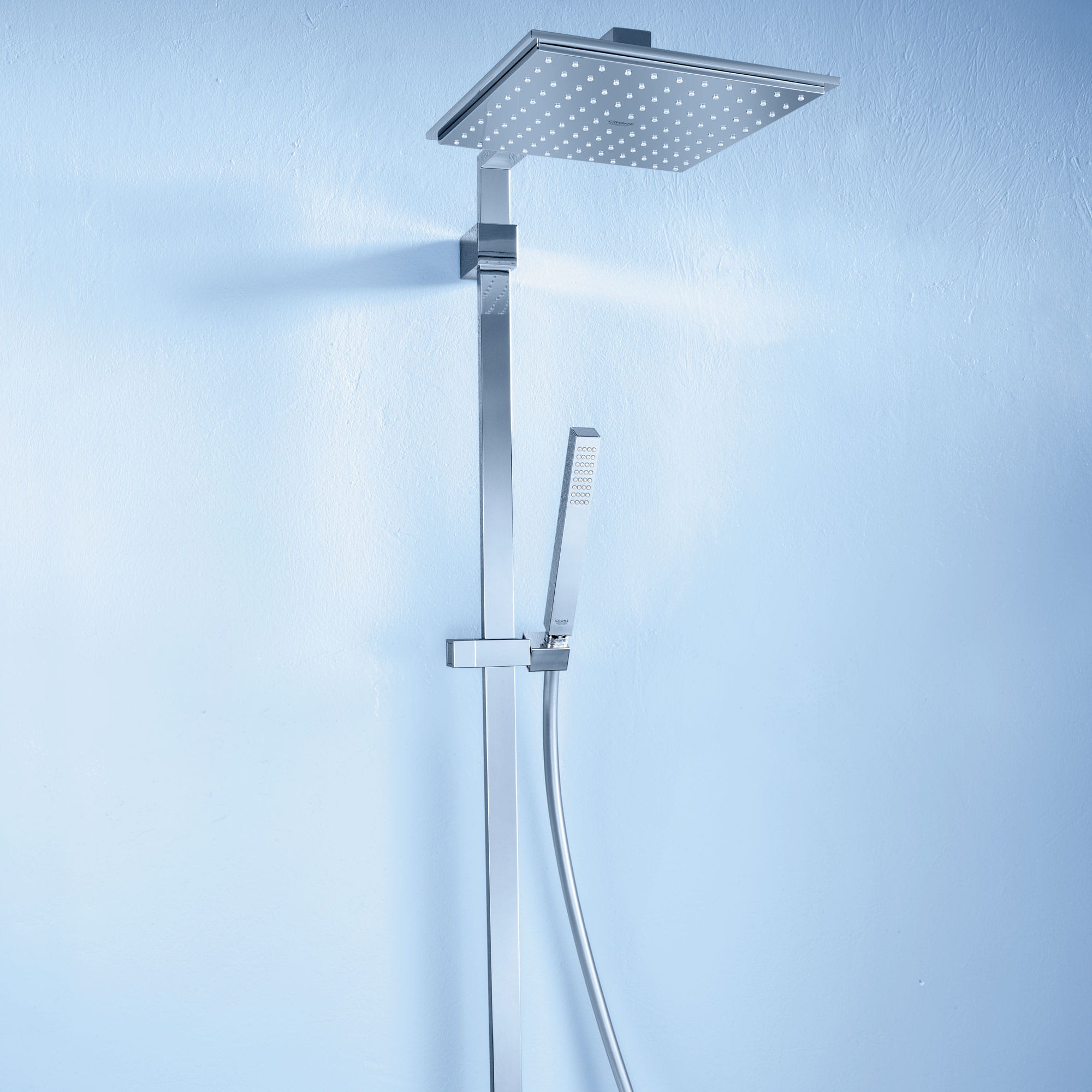 Grohe shower in a light blue bathroom.