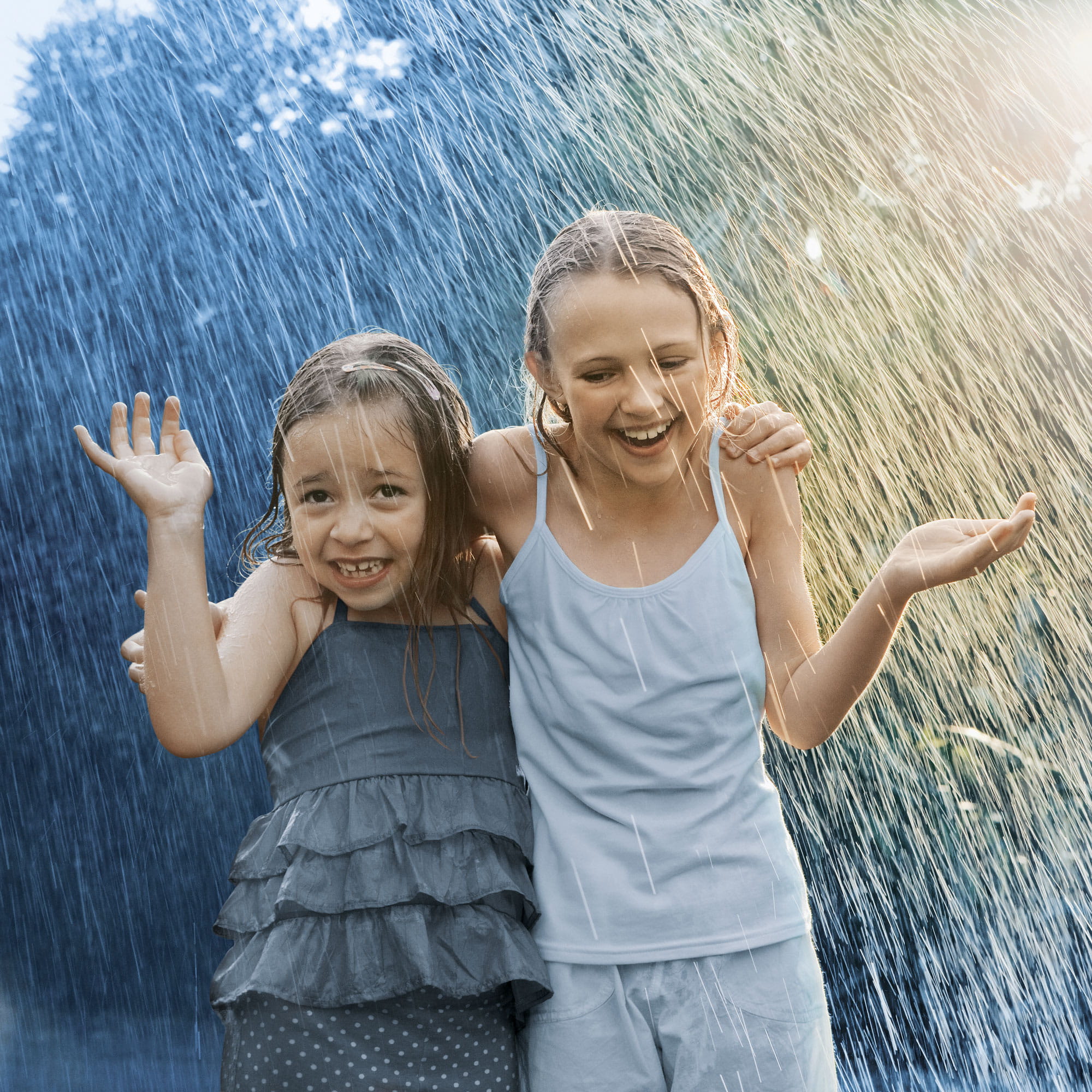 two girls in rain