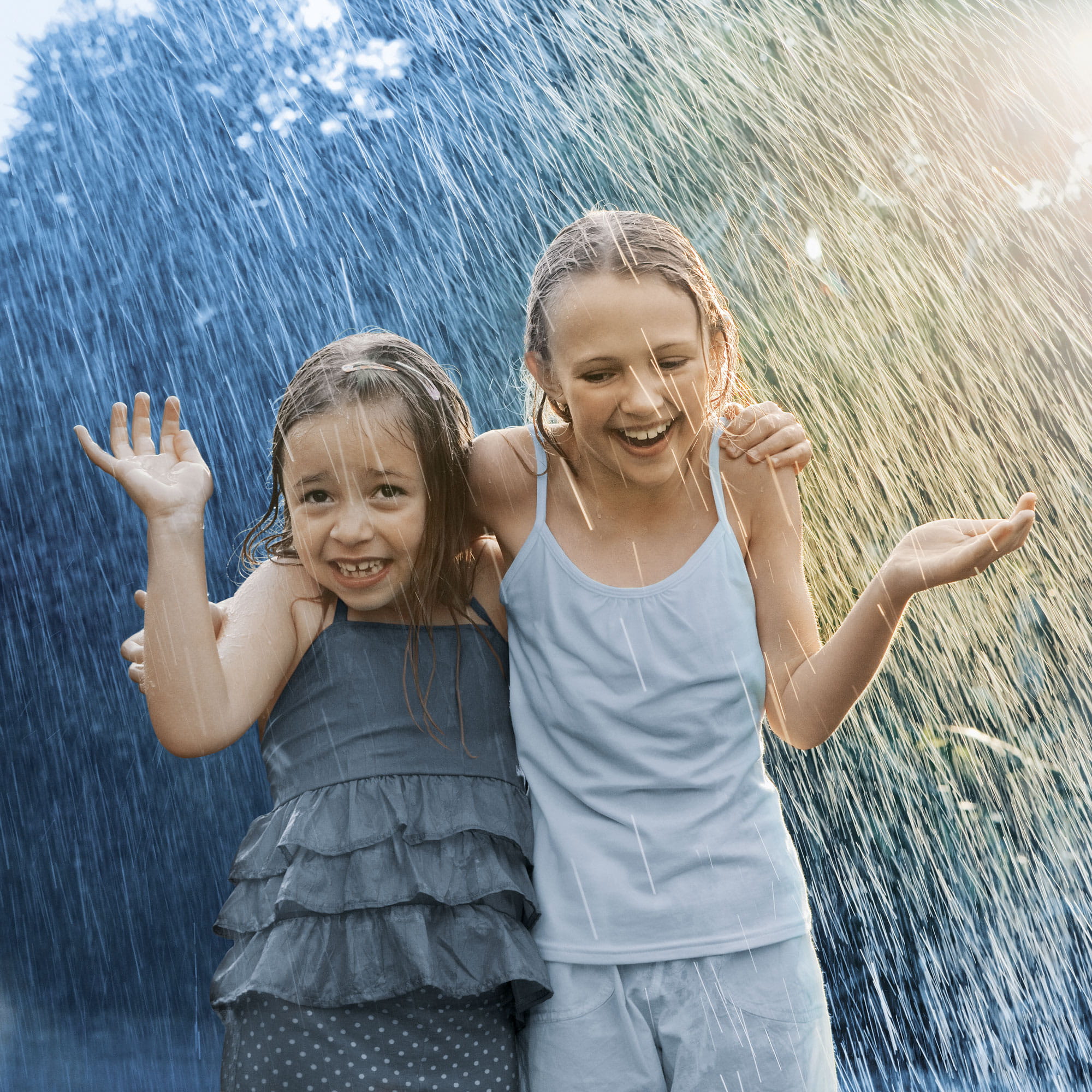 two girls in rain