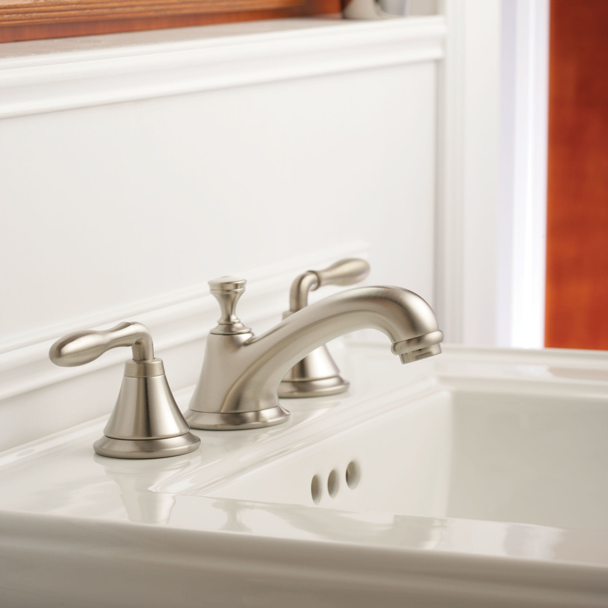 faucet with white background and white sink