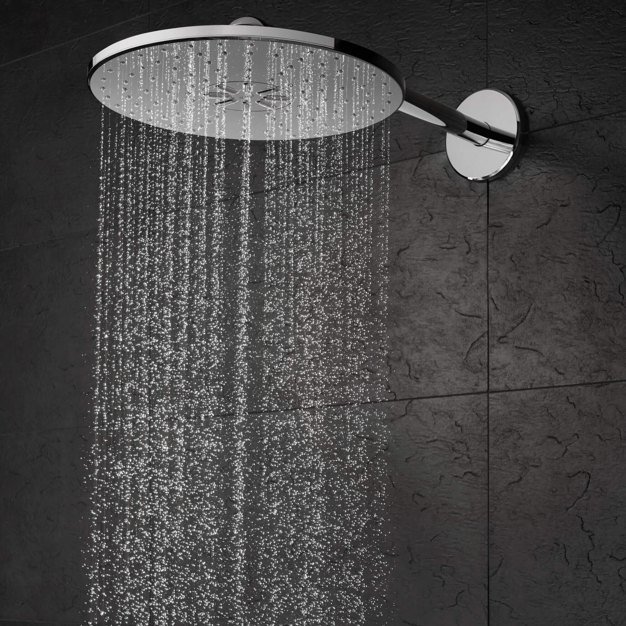 Grohe head shower spraying water.
