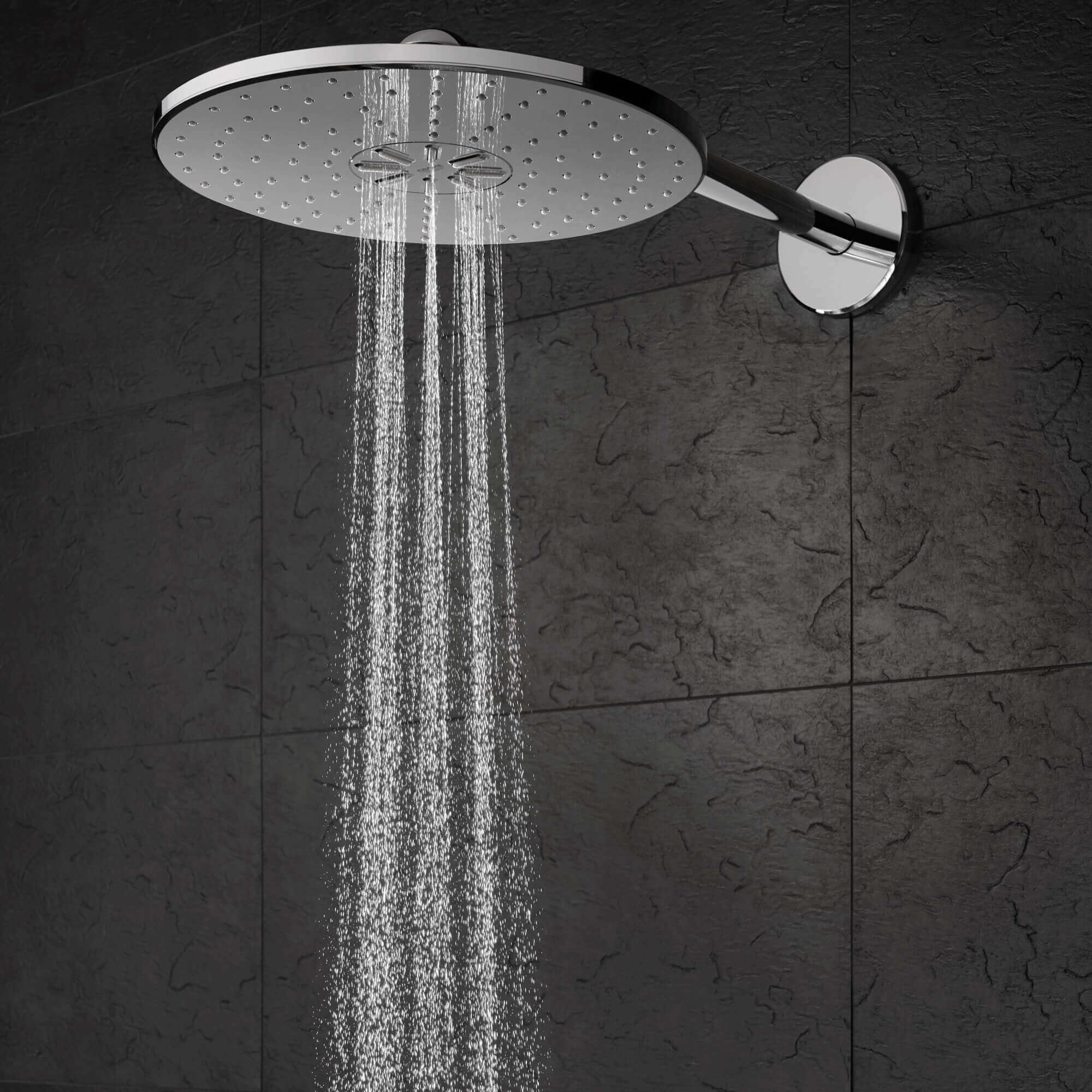 Grohe head shower spraying water.