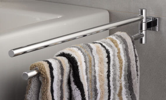 Striped towel on an Essentials cube accessory towel holder. 
