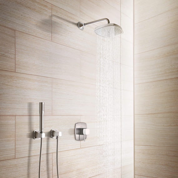 Grandera shower in a bathroom with wooden walls.