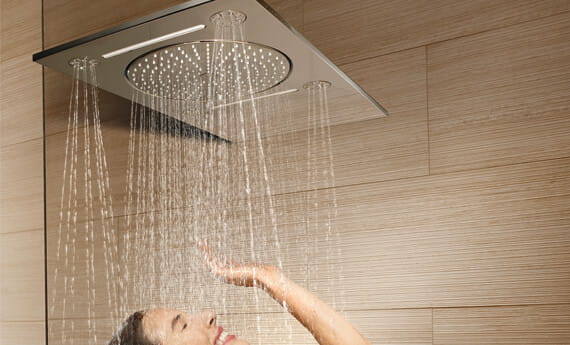 woman in shower using ceiling rainshower
