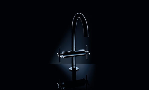 faucet with black background & dimmed lighting