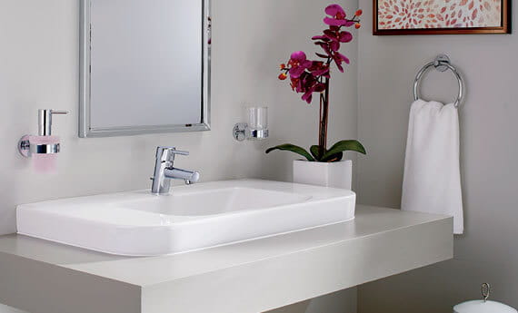 Concetto Bathroom Faucet in Bathroom with Orchids and Mirror